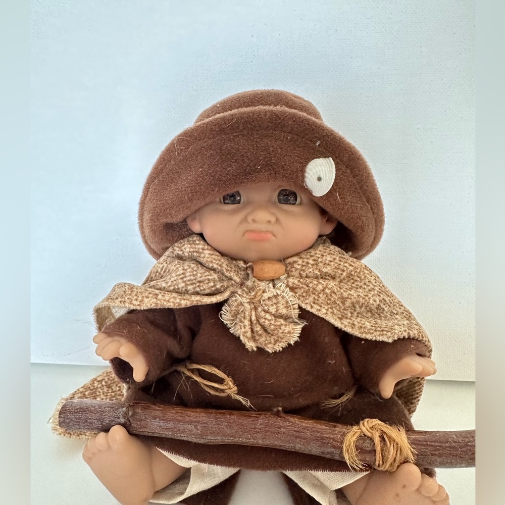 Little Franciscan monk boy doll with a stick
